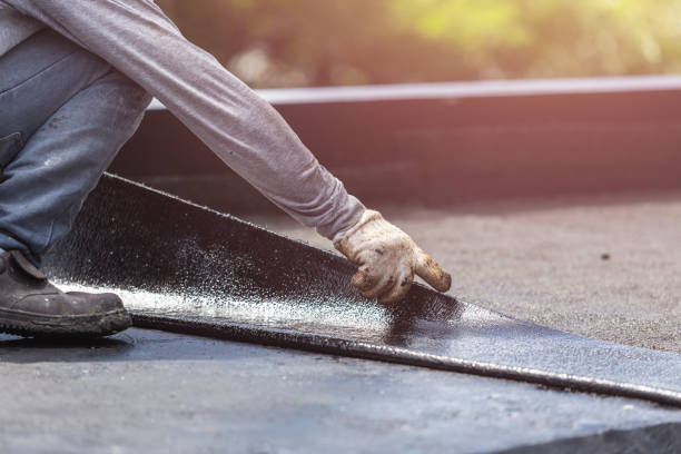 Professional Basement Waterproofing technician working in Brownsville, OH